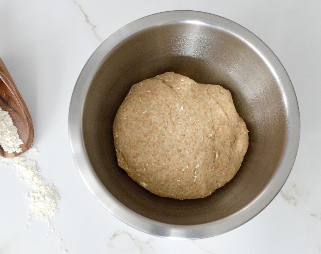 Homemade Honey Oatmeal Bread Recipe! This bread is made using whole wheat flour and oatmeal. It's dairy-free, refined-sugar free and out of this world delicious! 