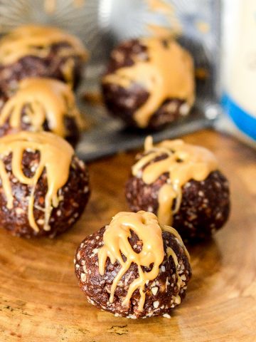 6 almond butter protein balls drizzled with almond butter