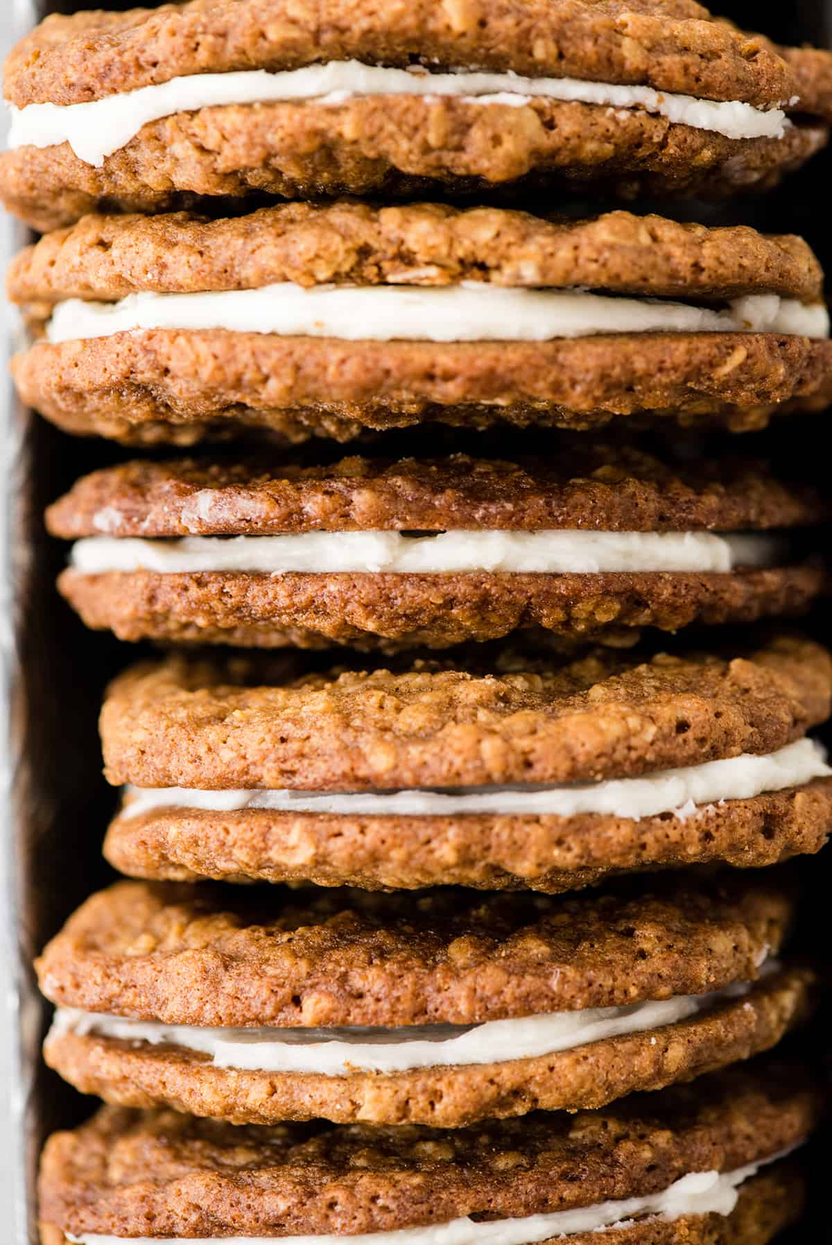 overhead view of 6 homemade oatmeal cream pies in a loaf pan