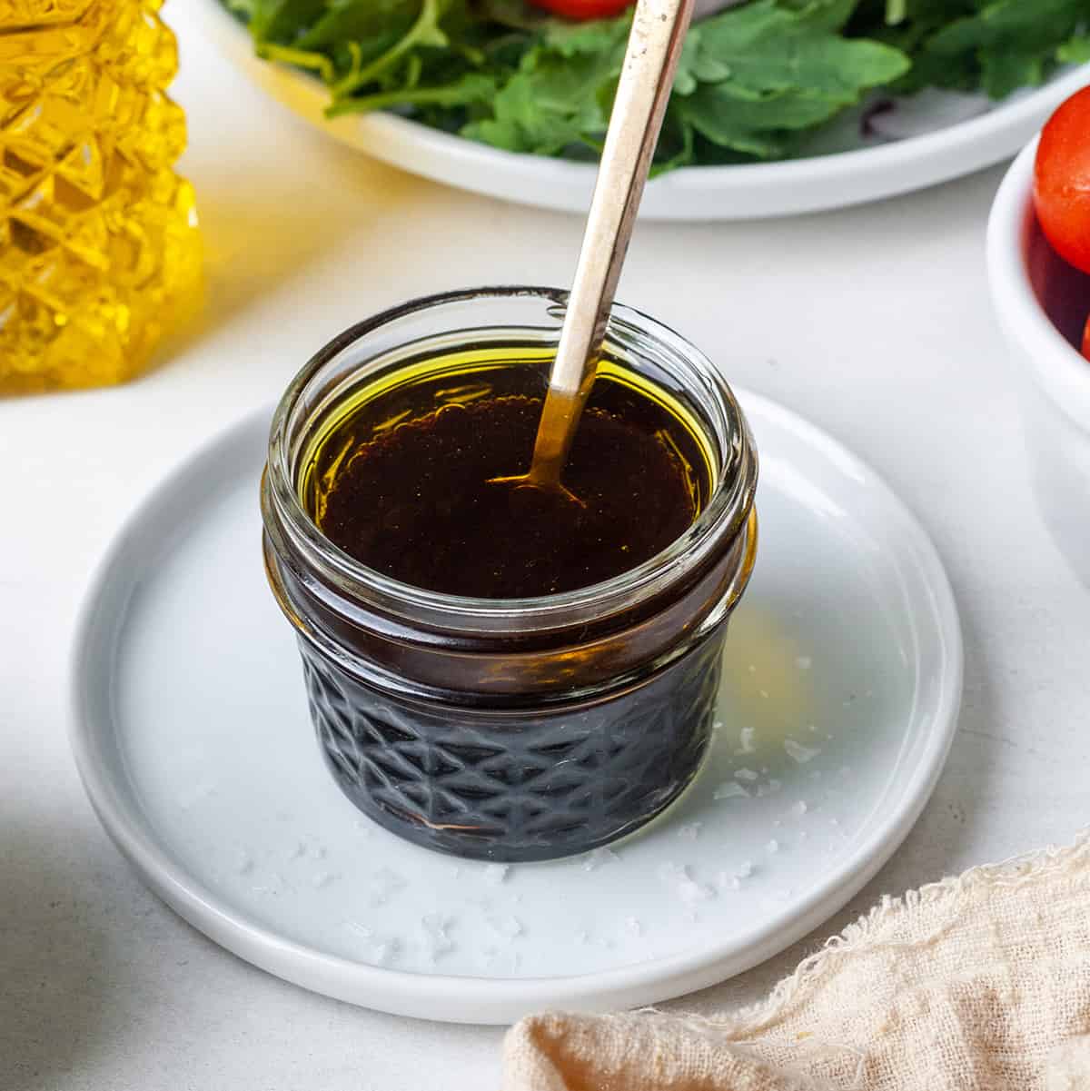 glass jar with Maple Balsamic Vinaigrette Dressing inside