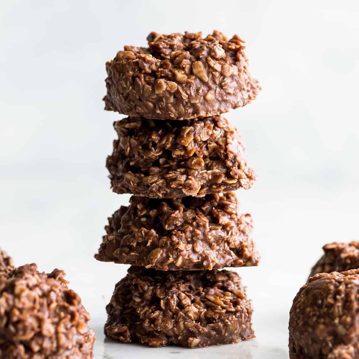 front view of a stack of 4 healthy no bake cookies