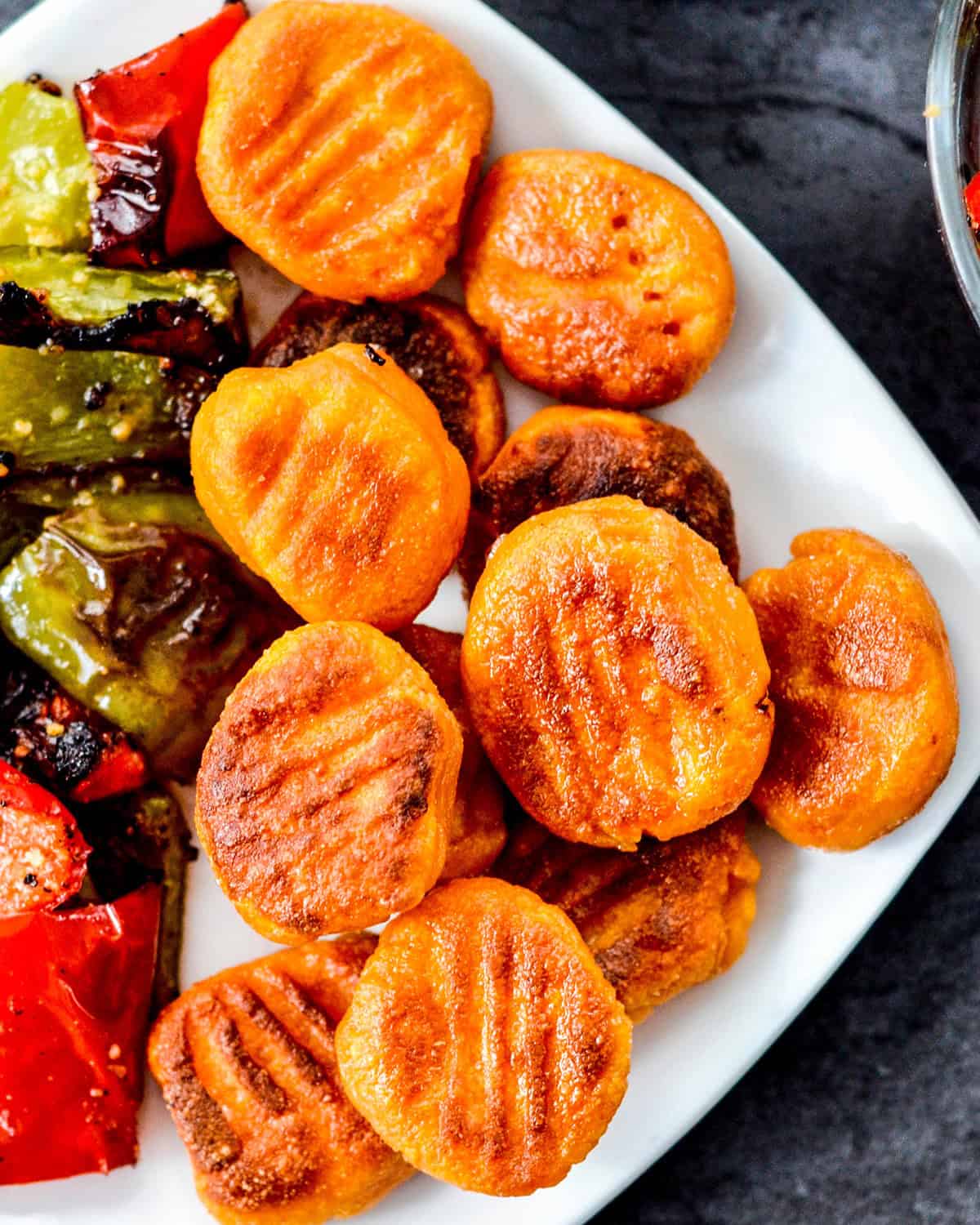 Paleo Sweet Potato Gnocchi on a plate with vegetables
