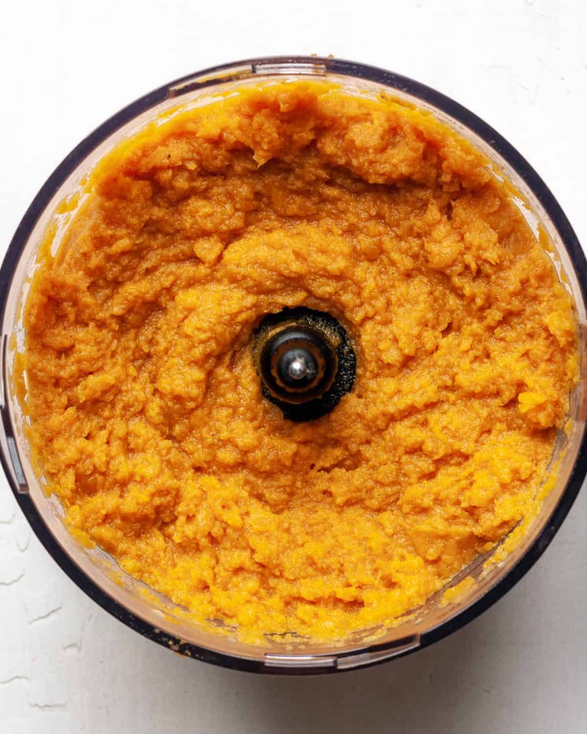 making healthy sweet potato casserole recipe - final filling mixture in a food processor fitted with the "S" blade.
