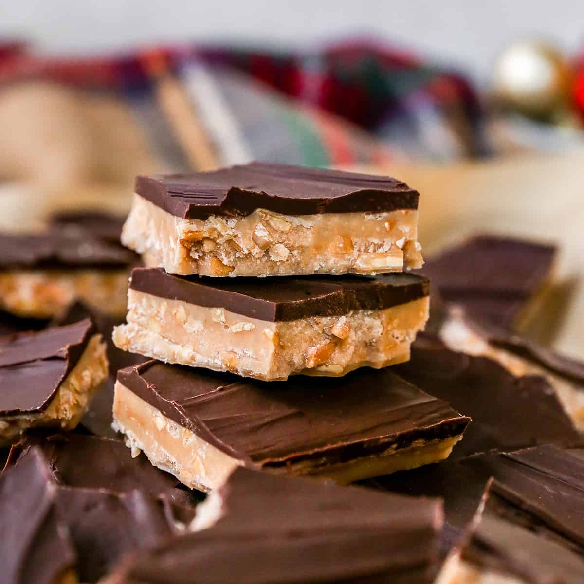 front view of pieces of almond toffee stacked on each other