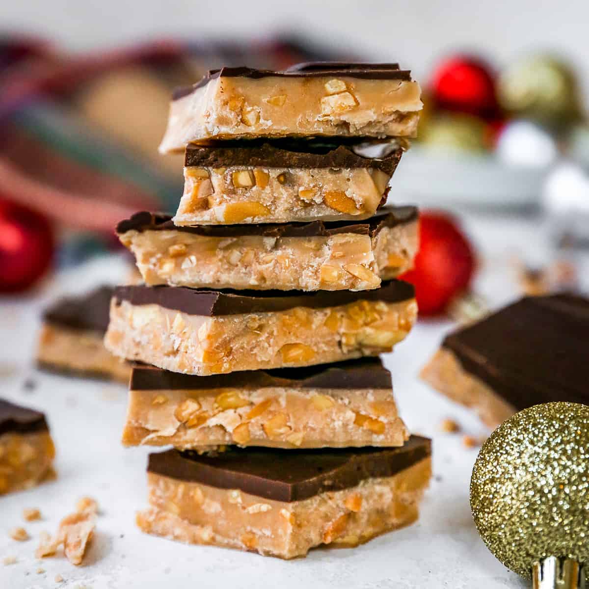 front view of a stack of six pieces of almond toffee