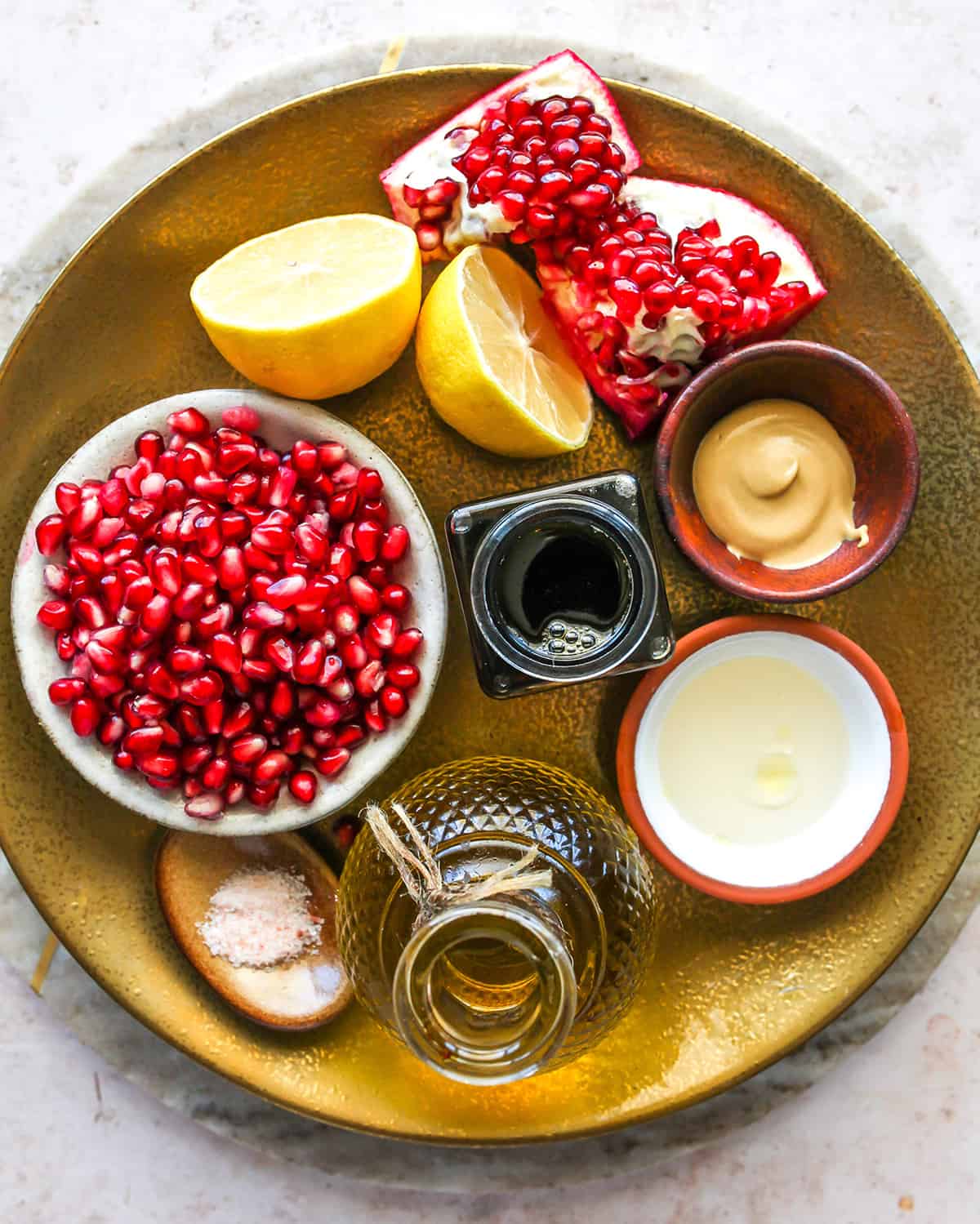 overhead view of the ingredients in this Pomegranate Dressing (Pomegranate Vinaigrette) recipe