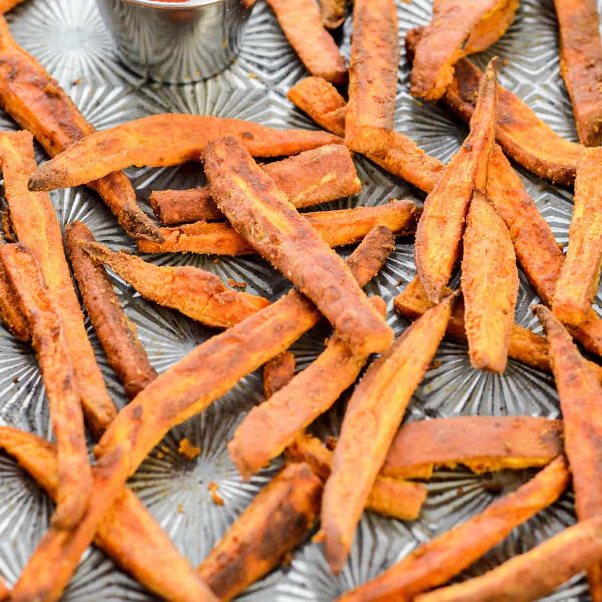 Overhead view of a baking sheet with Peanut Butter Sweet Potato Fries