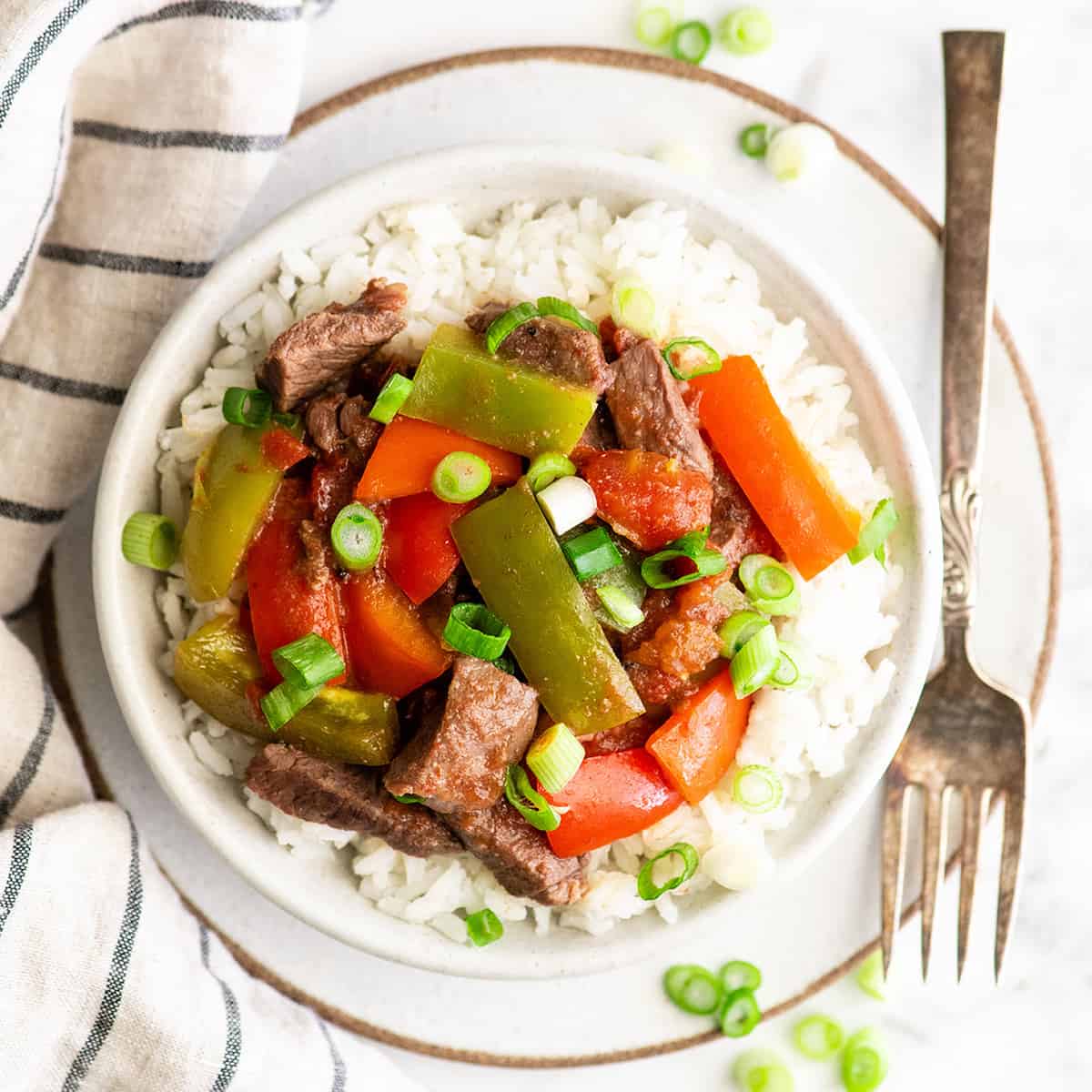 Slow Cooker Pepper Steak with Onion Recipe - The Magical Slow Cooker