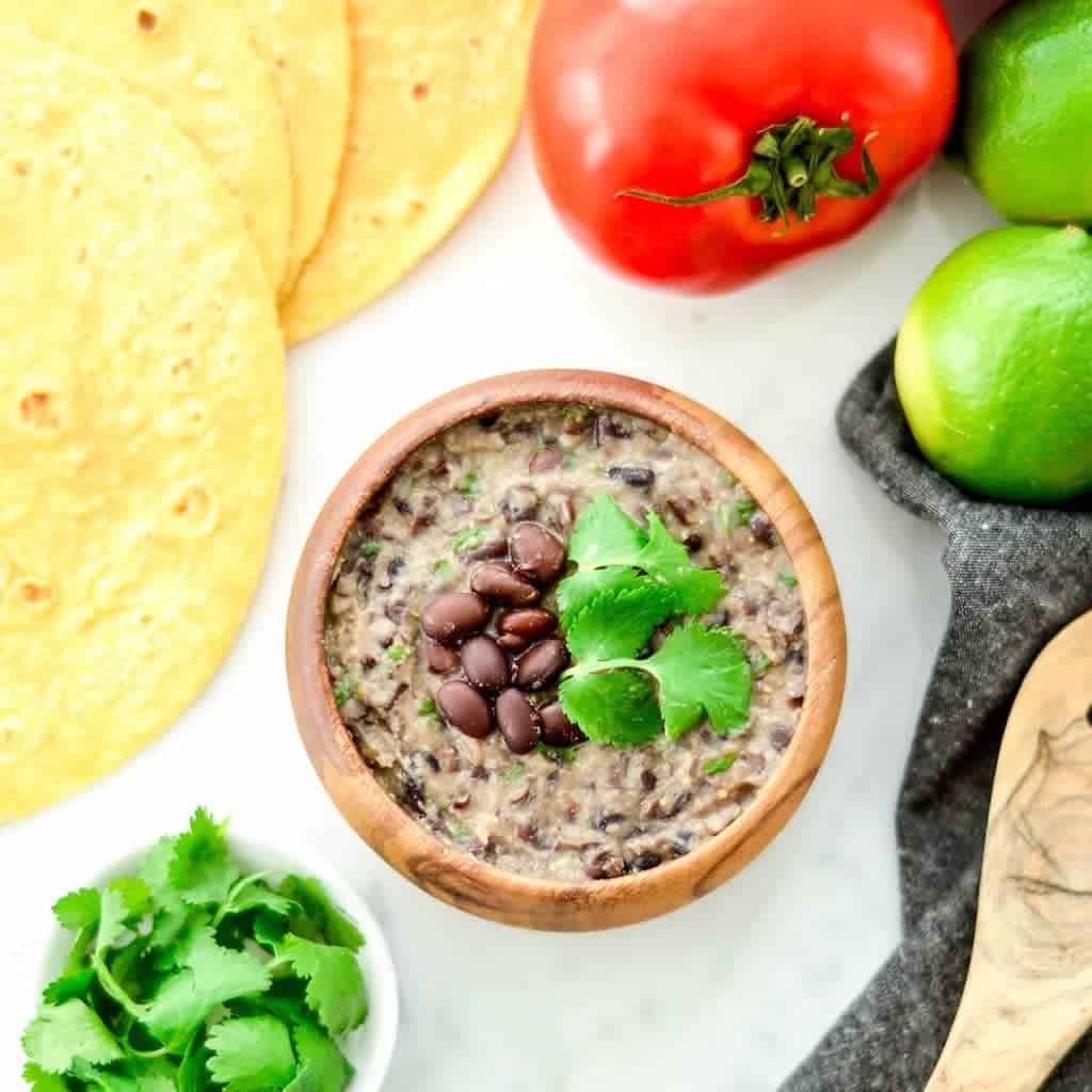 Overhead view of a bowl of Homemade Refried Black Beans 