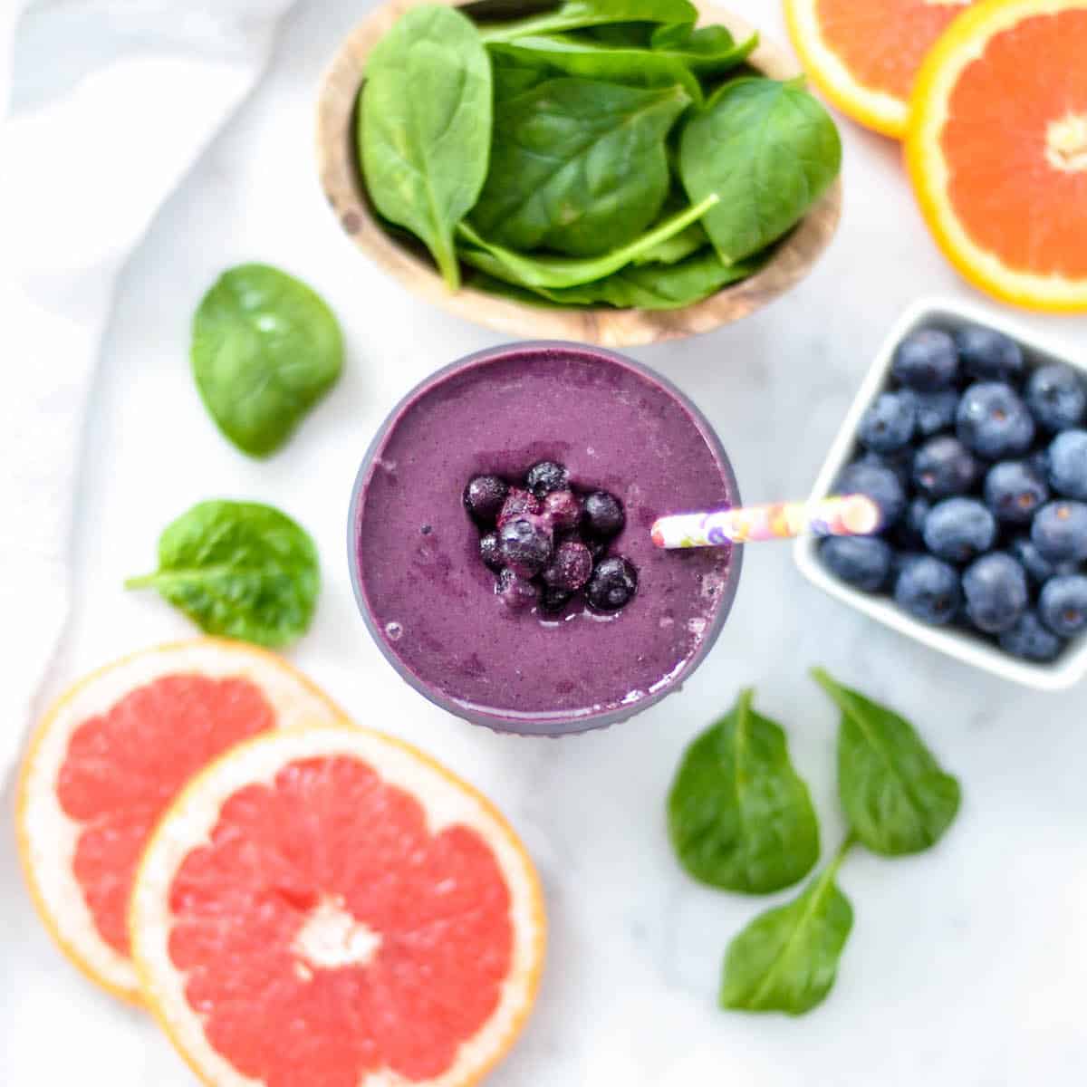 Overhead view of a Blueberry Citrus Smoothie with Spinach