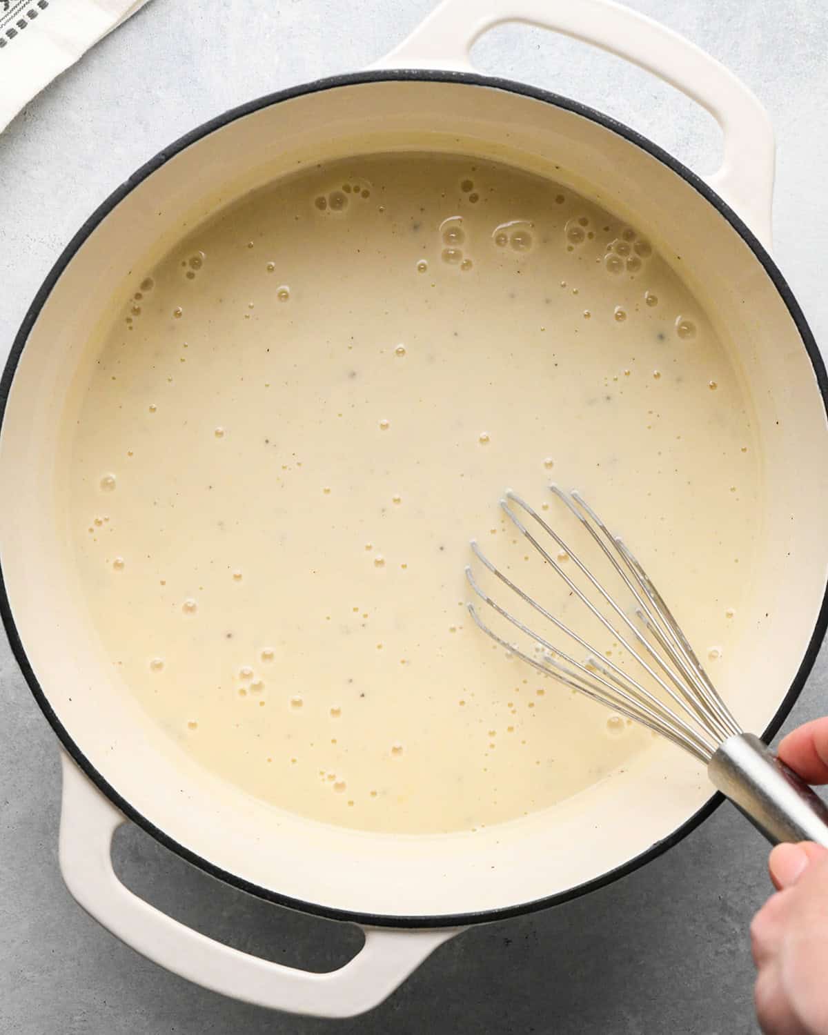 making Chicken Pot Pie Soup - sauce cooking and being whisked