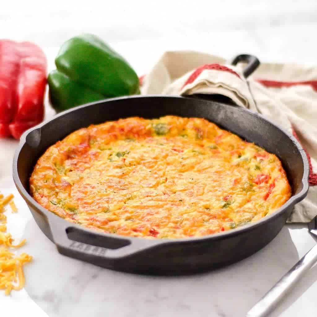front view of Gluten-Free Crustless Quiche in a cast iron skillet