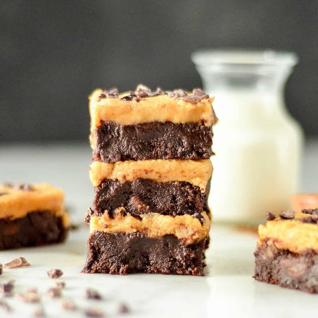 Front view of a stack of three Fudgy Flourless Peanut Butter Brownies