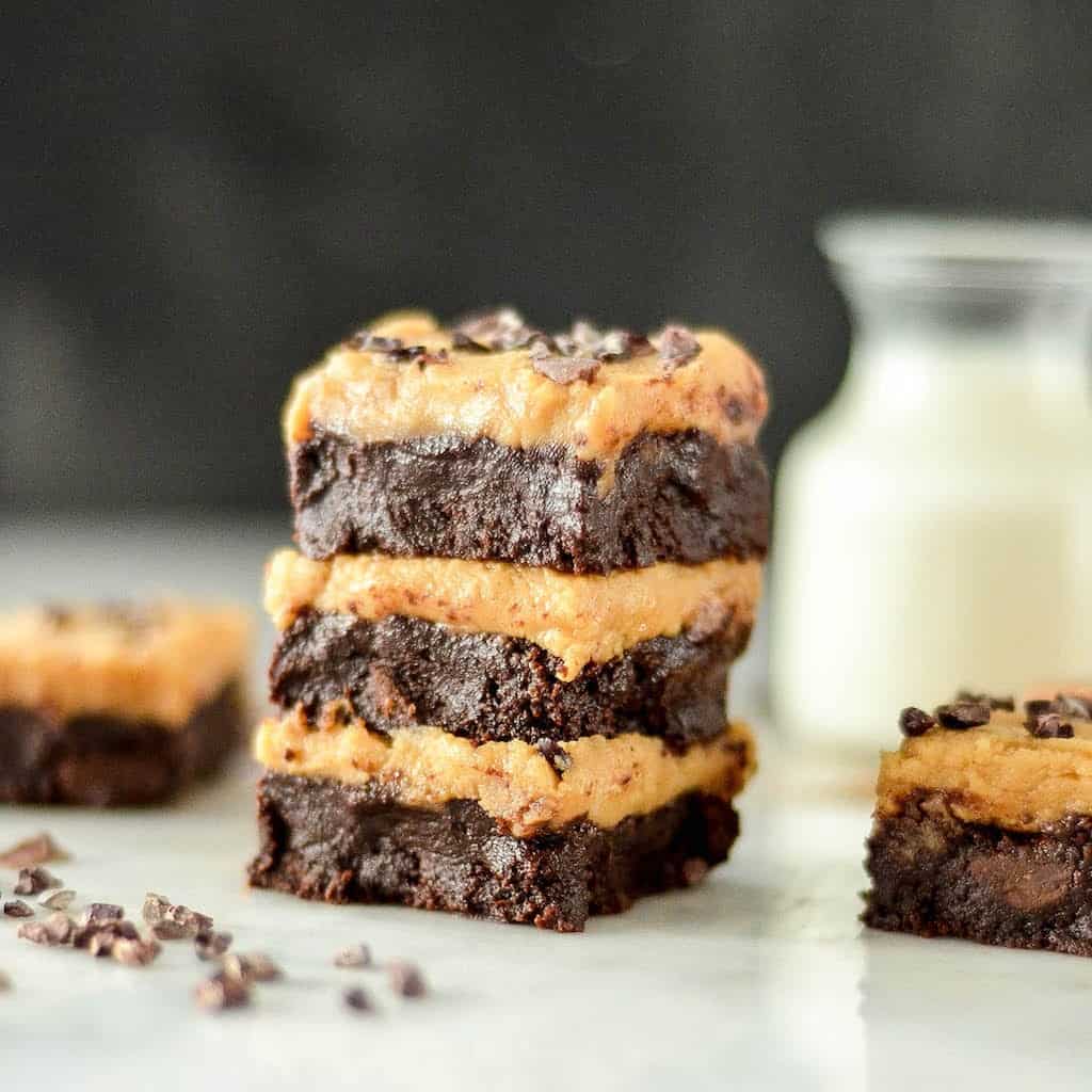 front view of a stack fo three Fudgy Flourless Peanut Butter Brownies