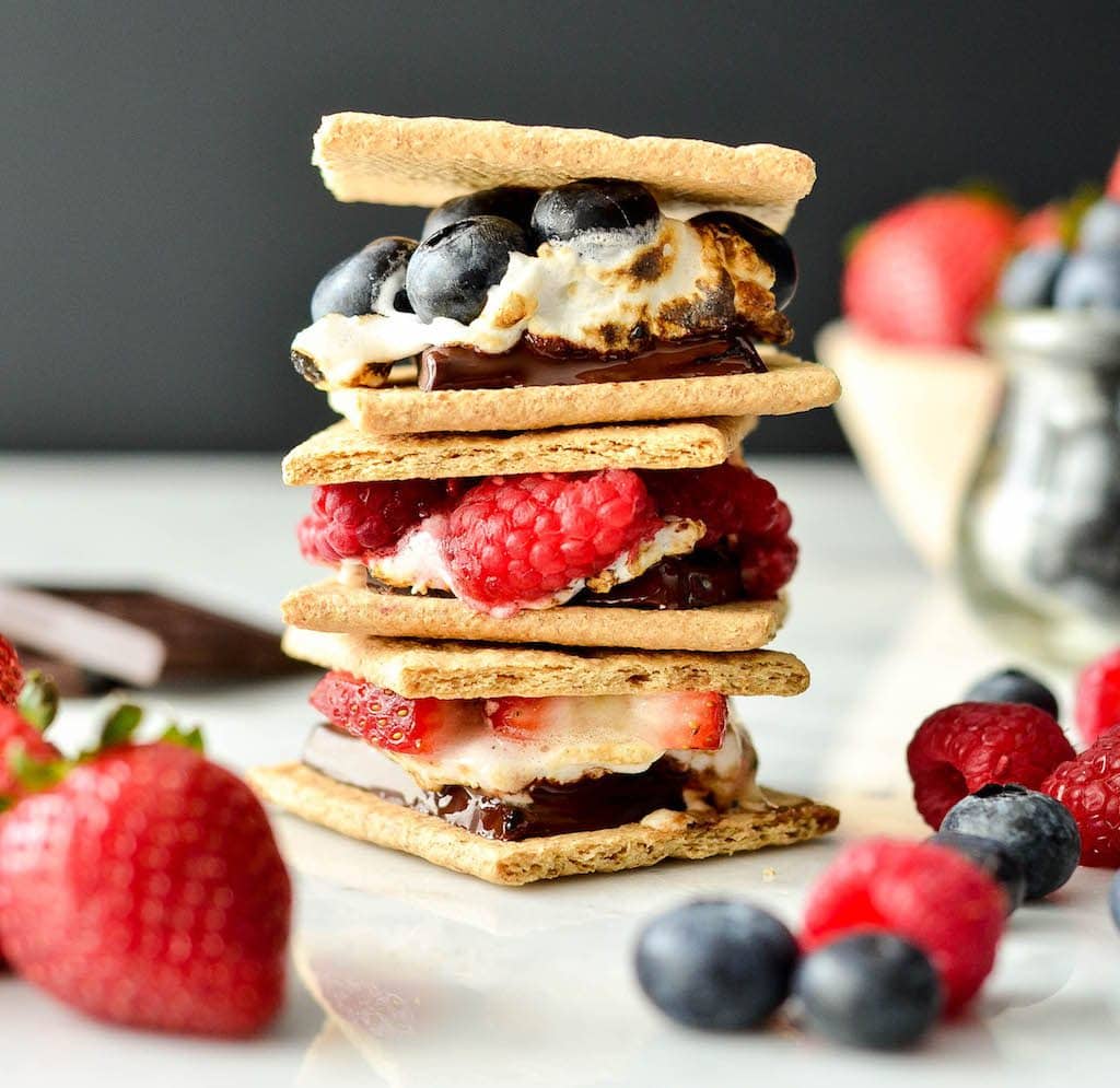 front view of a stack of three Dark Chocolate S'mores with Fresh Berries