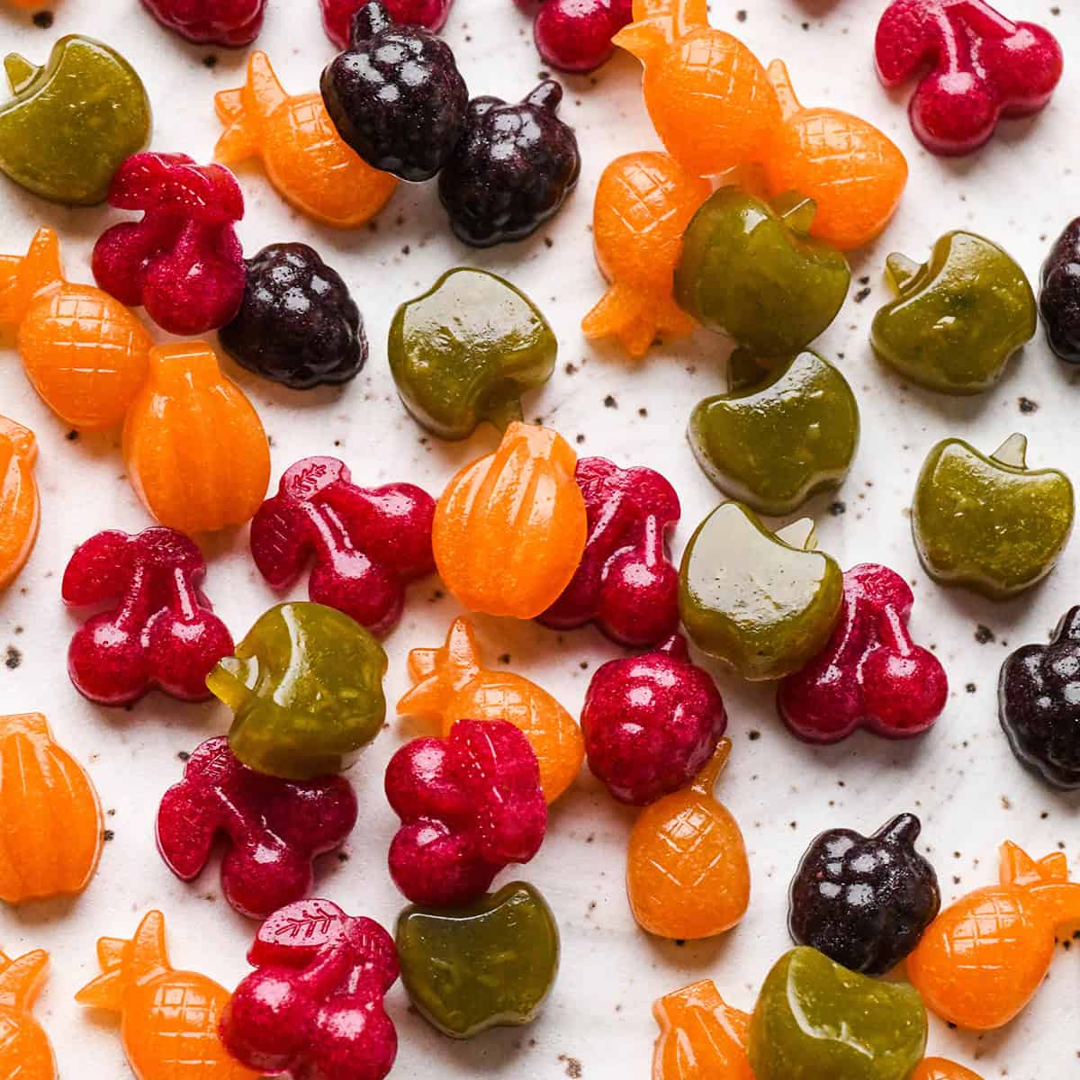 a pile of red, green, purple and orange Homemade Fruit Snacks