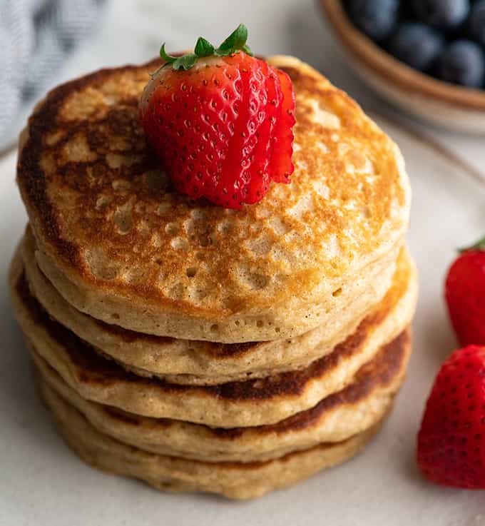 overhead view of a stack of 5 whole wheat pancakes