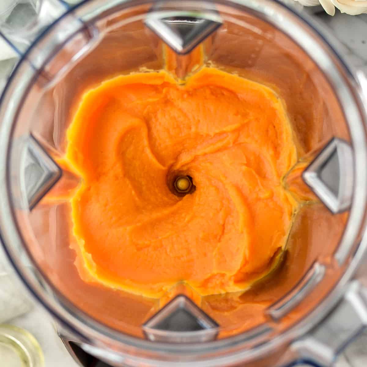 Overhead view of Homemade Sweet Potato Baby Food puree in the vitamix blender 