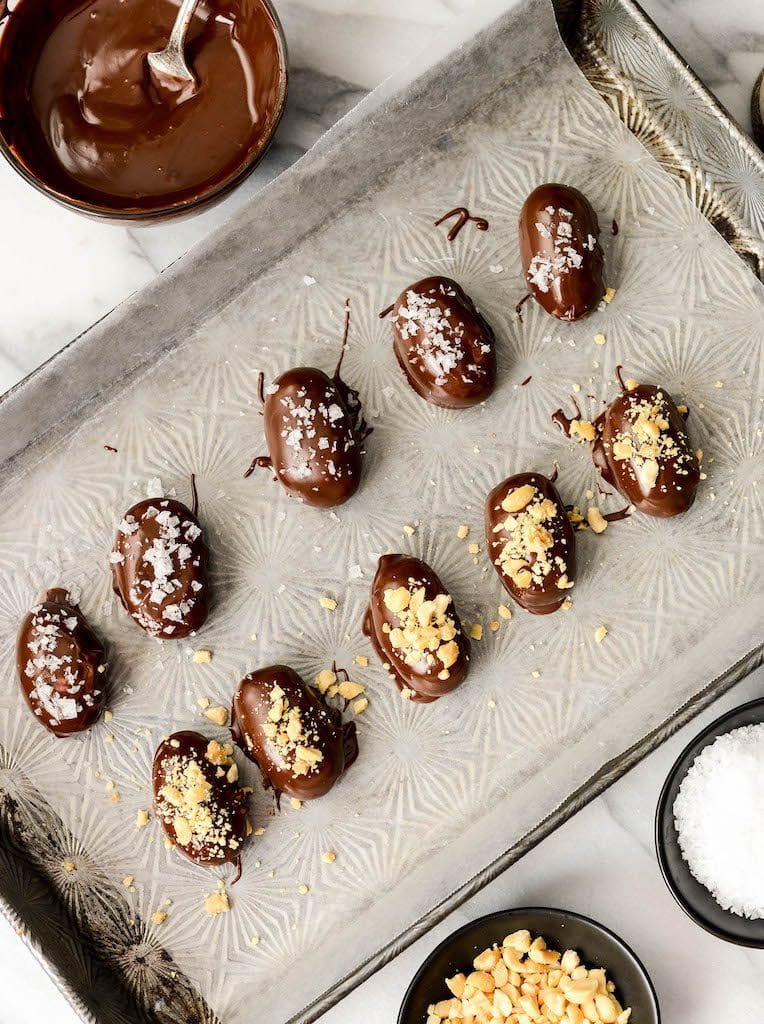 Chocolate Peanut Butter Coconut Truffles! A healthy candy recipe that's the perfect alternative for Halloween candy! Gluten & grain-free, vegan, dairy-free! 