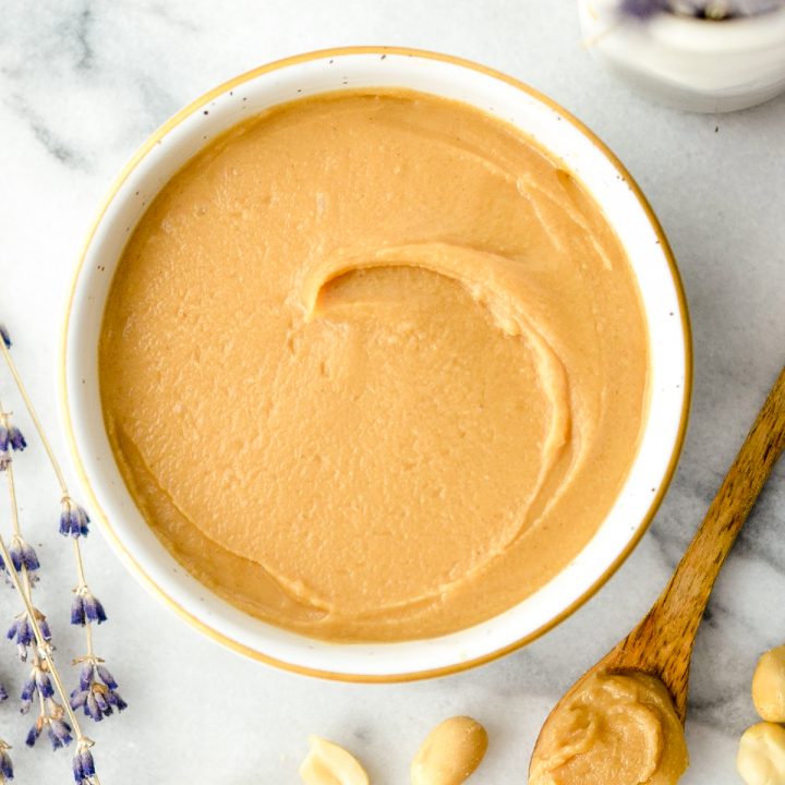 Overhead view of a bowl of homemade vegan peanut butter frosting