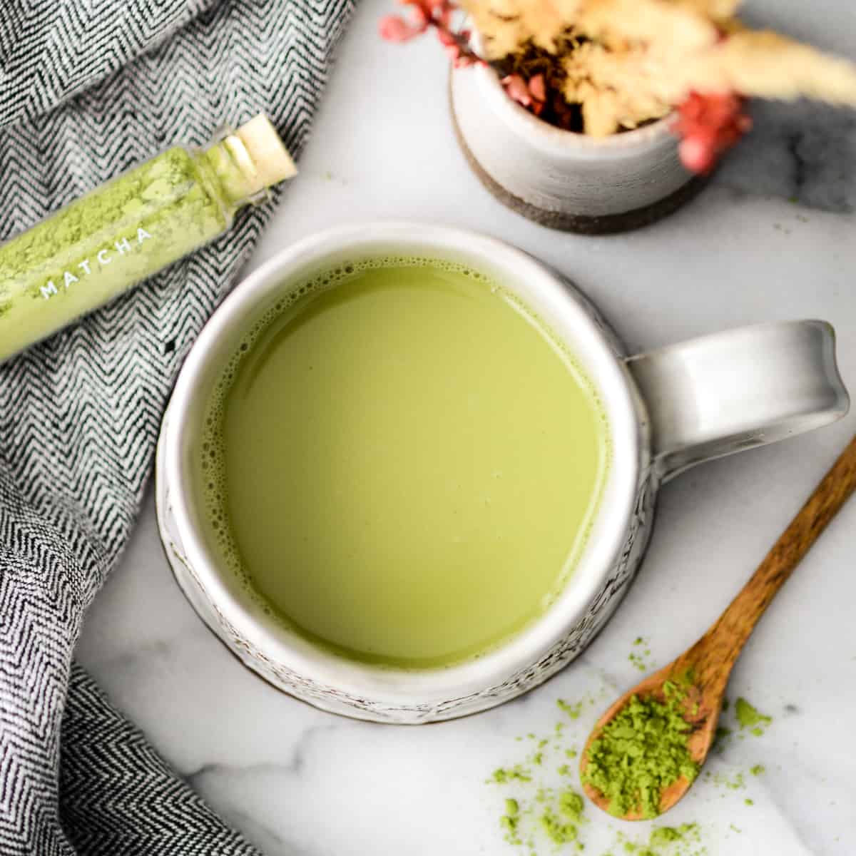 overhead view of Collagen Matcha Latte Recipe in a mug