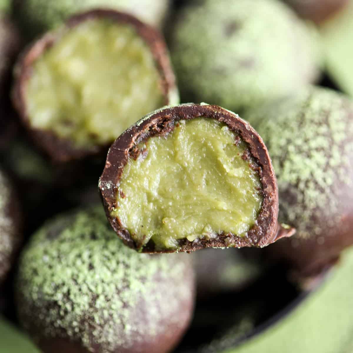 a Healthy Matcha Truffle cut in half so you can see the inside