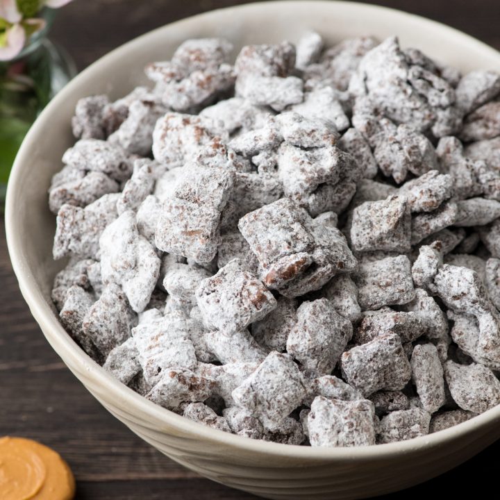 Side view of a bowl of the best puppy chow recipe 