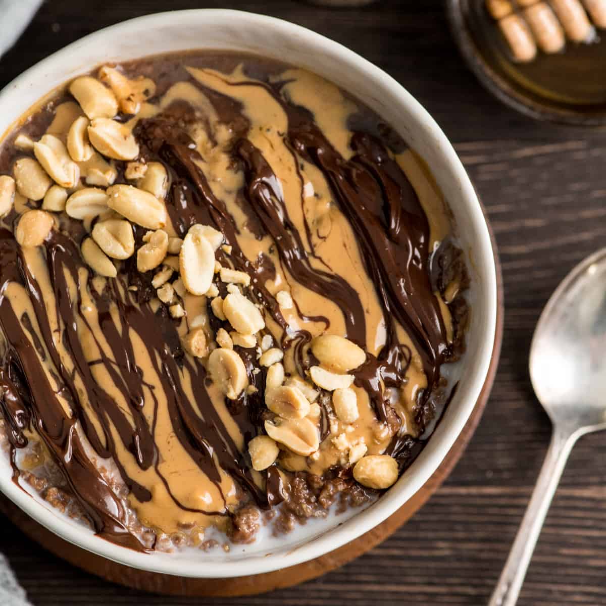 overhead view of a bowl of chocolate peanut butter oat bran 