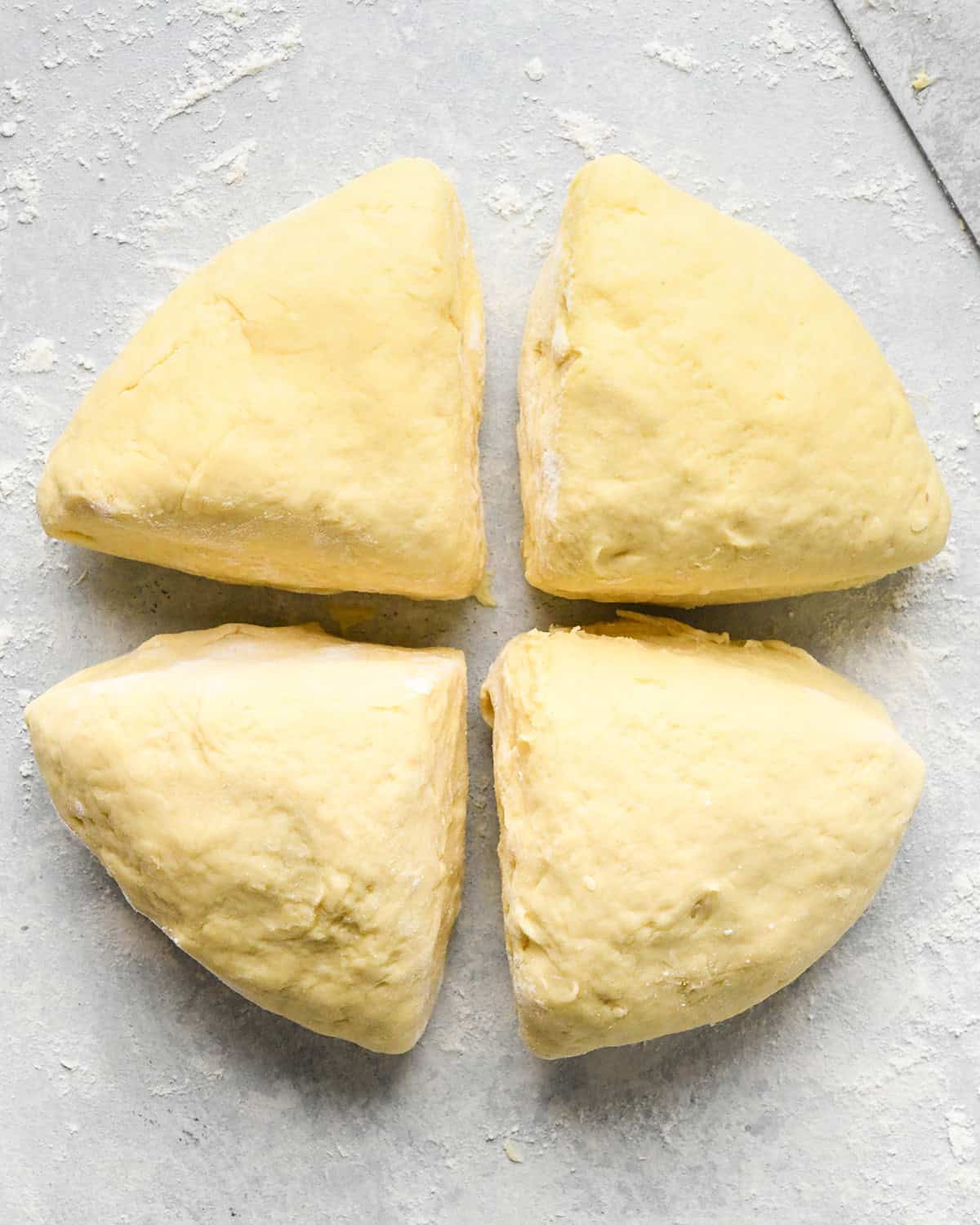 How to Make Potato Gnocchi - dough split into 4 pieces