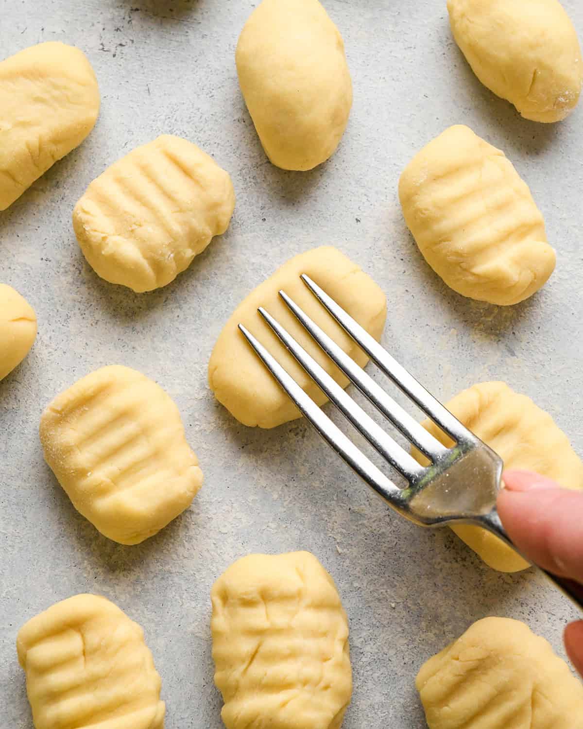 How to Make Potato Gnocchi - making fork lines on the top