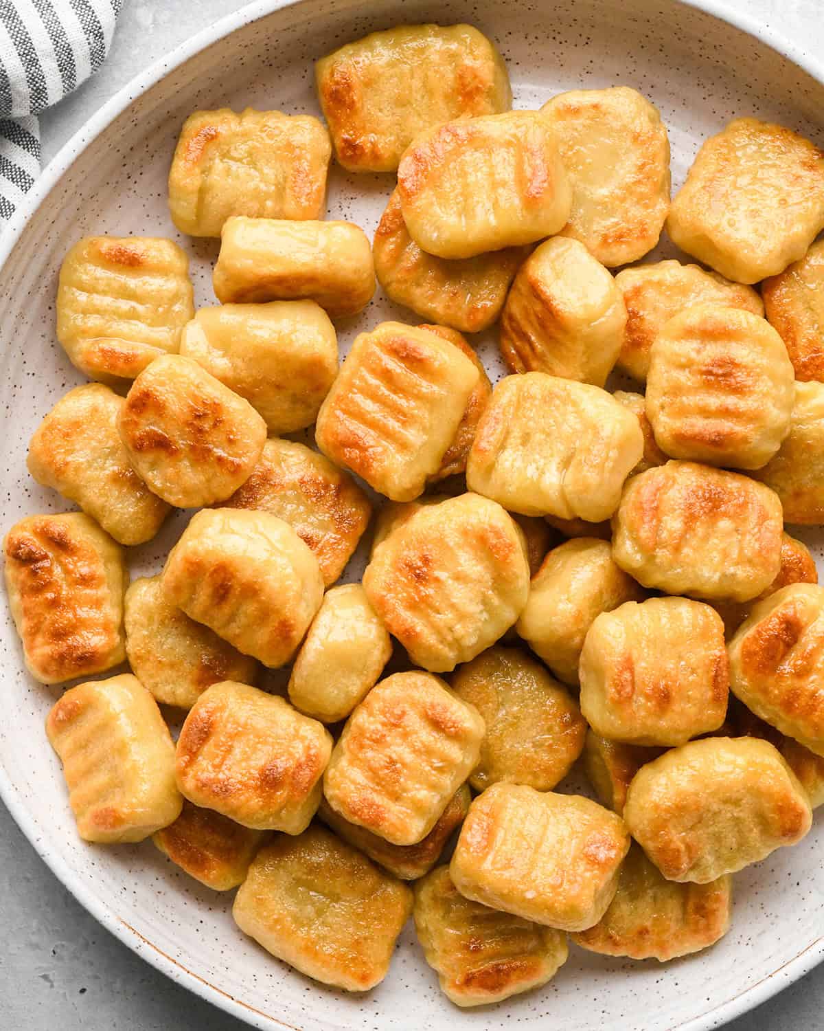 Potato Gnocchi browned potato gnocchi on a plate