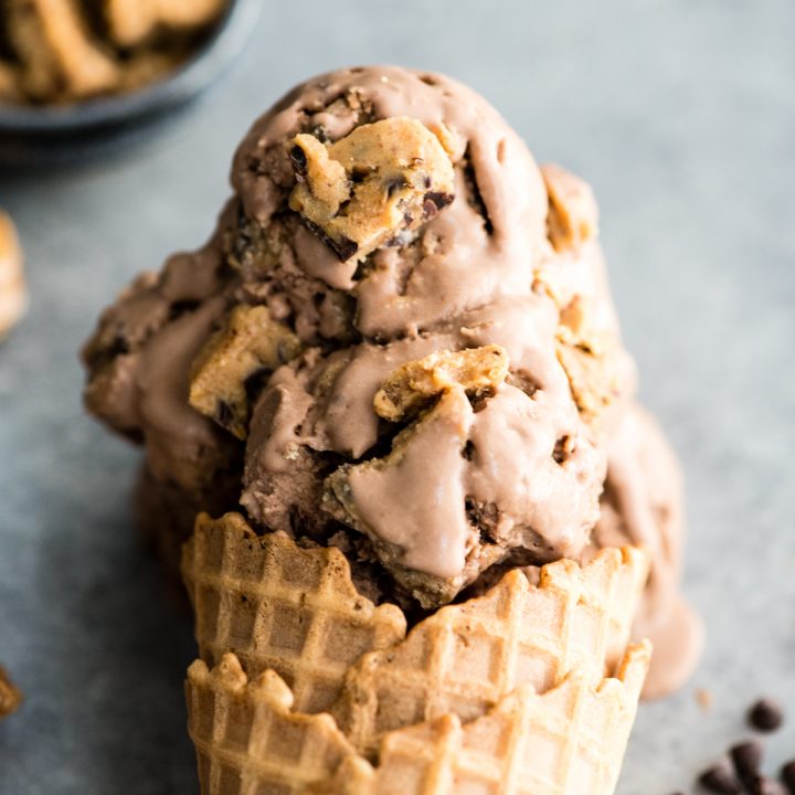 overhead view of Dairy-Free Chocolate Peanut Butter Cookie Dough Ice Cream in a waffle cone