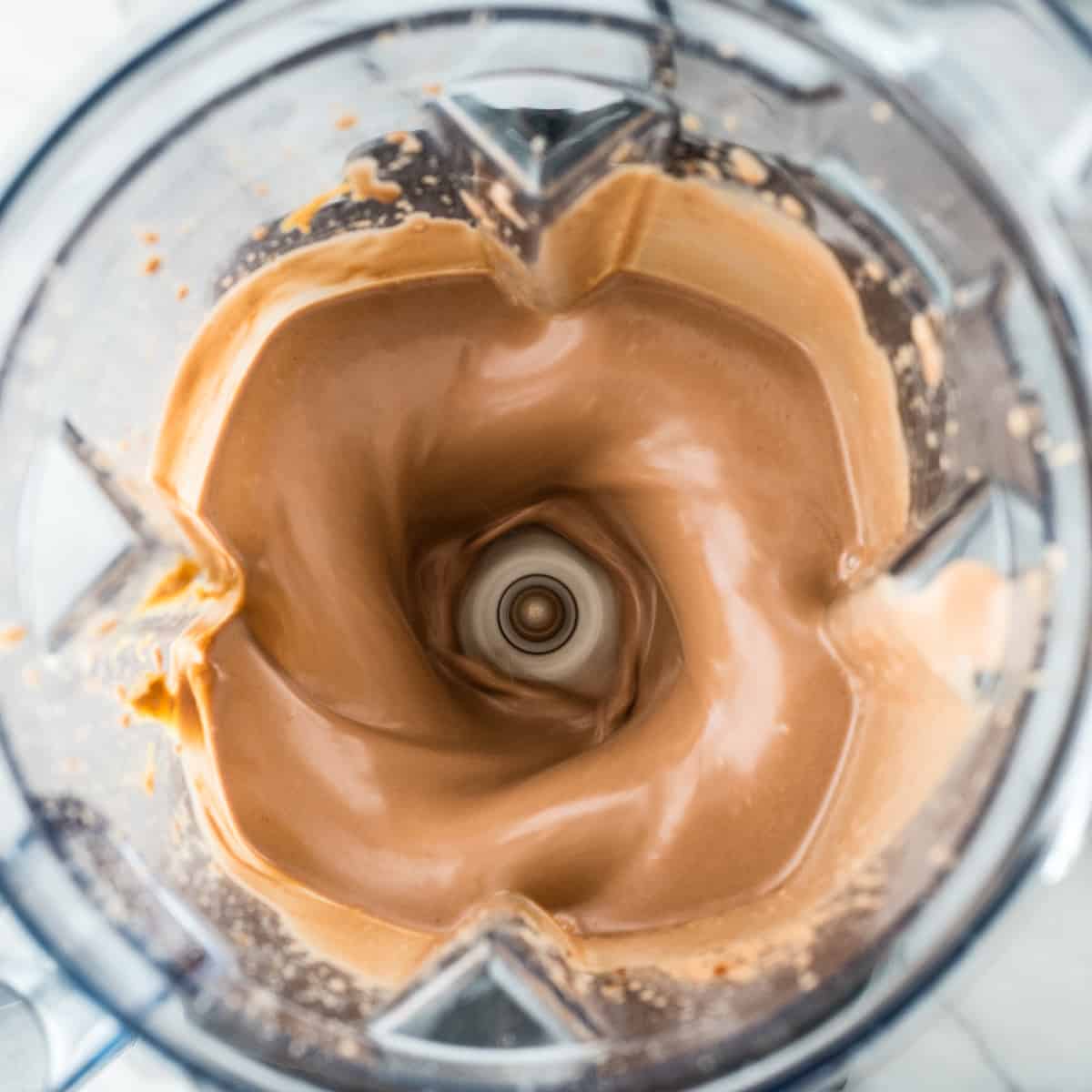 overhead view of the Chocolate Peanut Butter Cookie Dough Ice Cream base blending