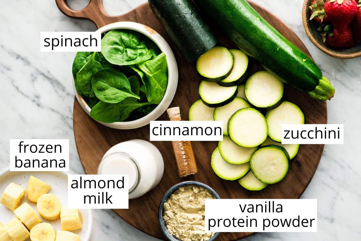 overhead photo of the labeled ingredients in this zucchini smoothie recipe
