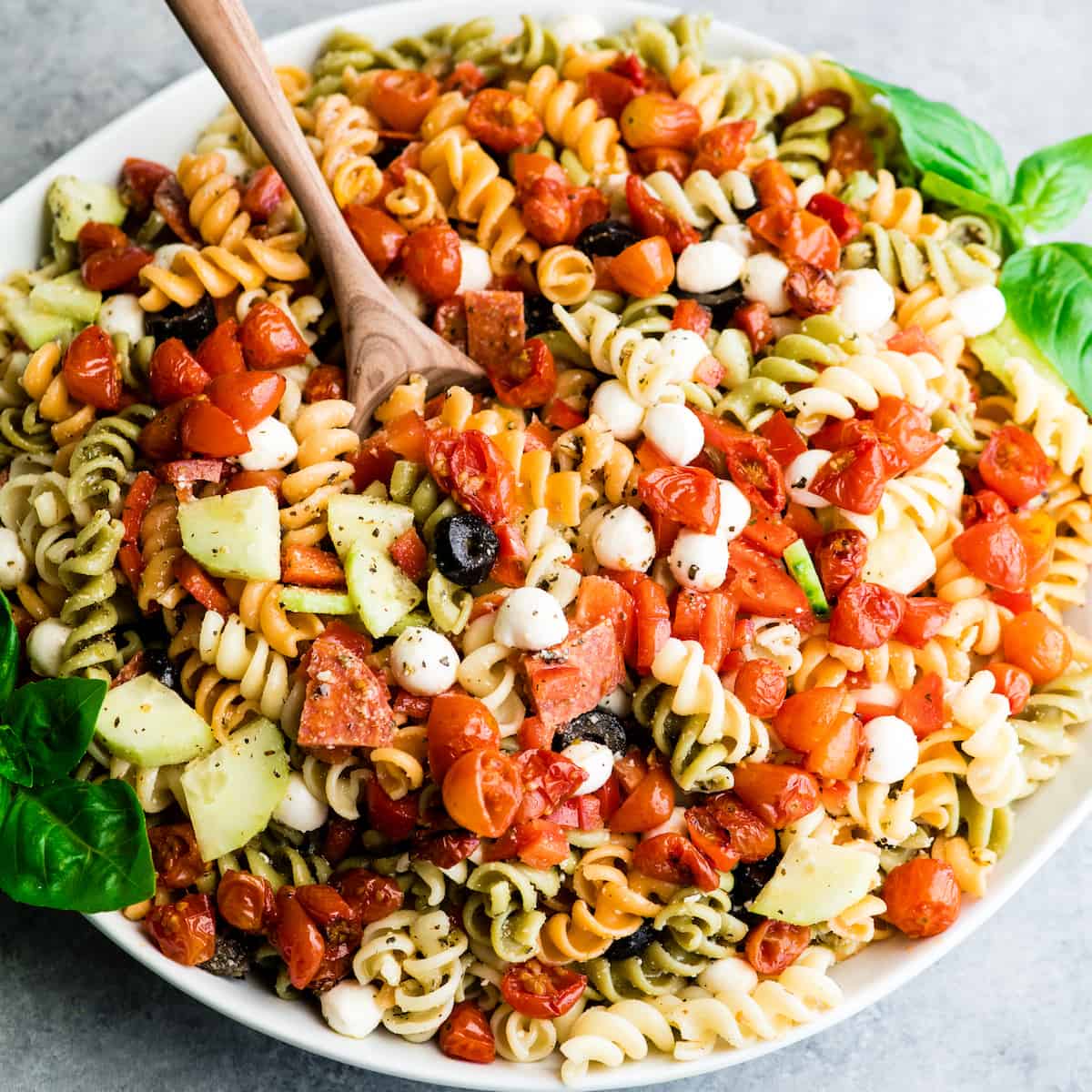 overhead view of the best pasta salad recipe in a large white serving bowl