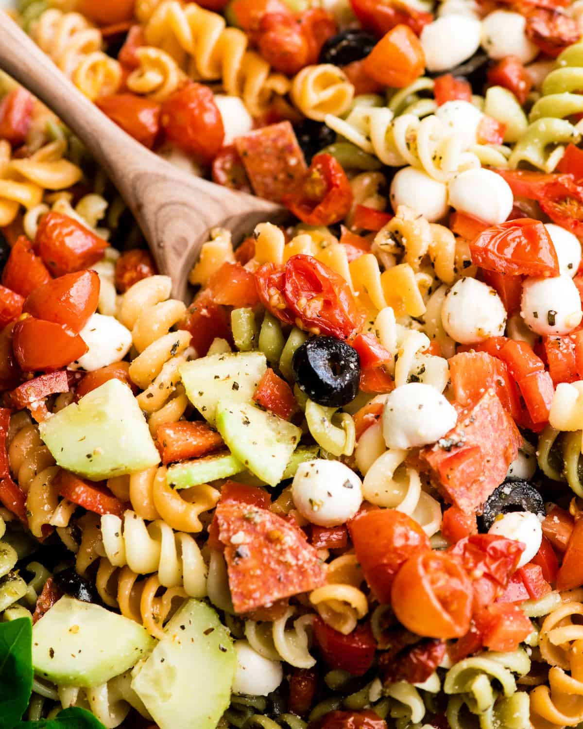 overhead view of the best pasta salad recipe in a large white serving bowl