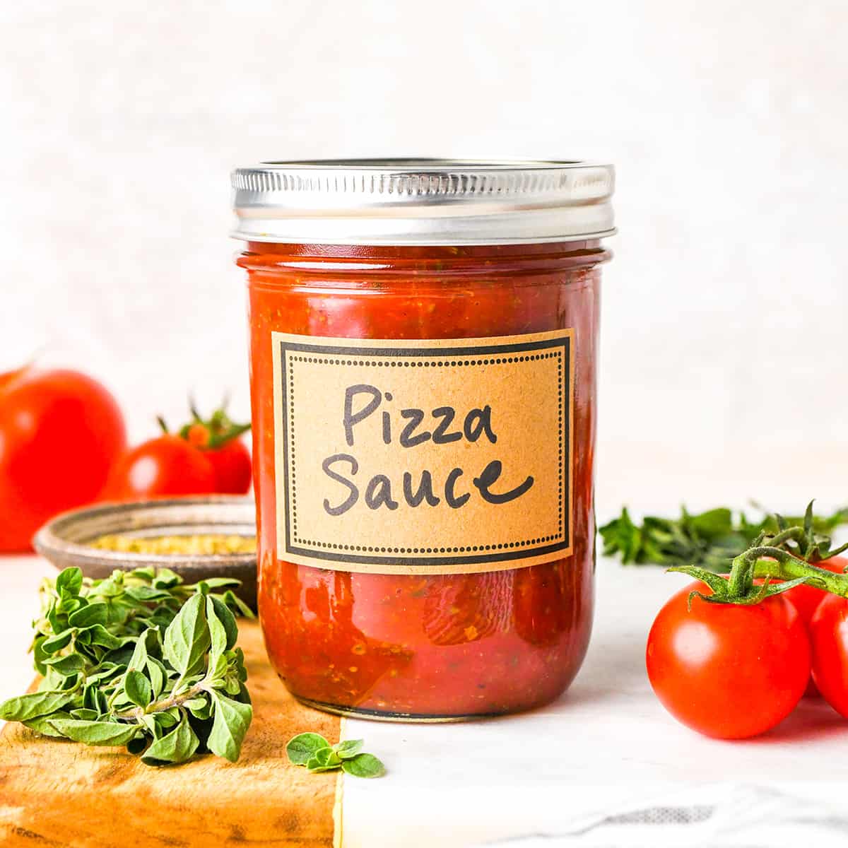 pizza sauce in a glass jar labeled