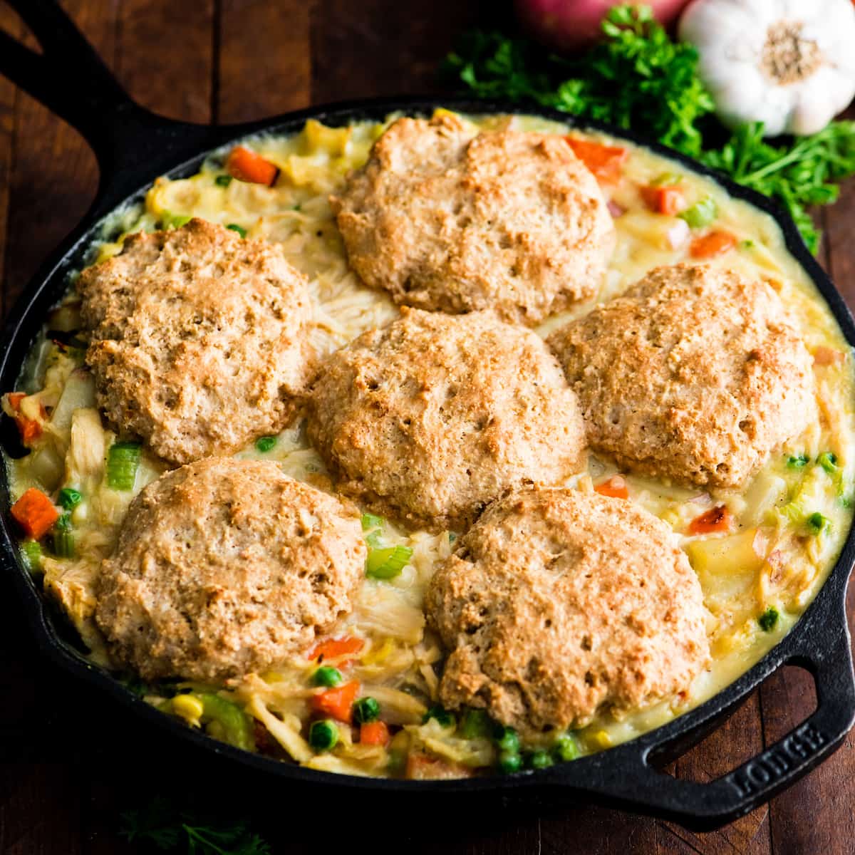 Front view of a cast iron skillet with Healthy Chicken Pot Pie baked in it