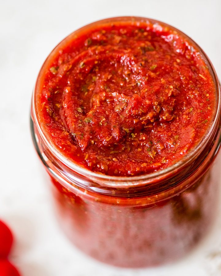 Front view of a jar of Homemade Pizza sauce