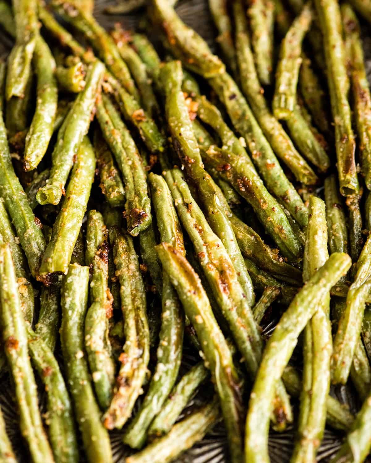 up close overhead view of Roasted Parmesan Green Beans on a baking sheet