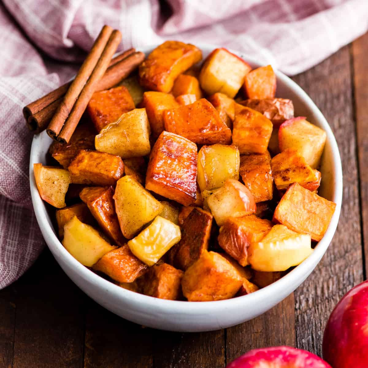 front view of a bowl of Cinnamon Roasted Sweet Potatoes and Apples