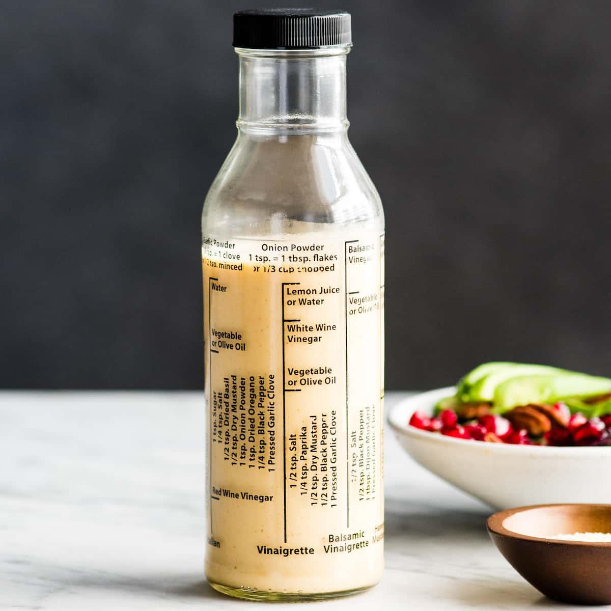 front view of Apple Cider Vinaigrette in a glass bottle 