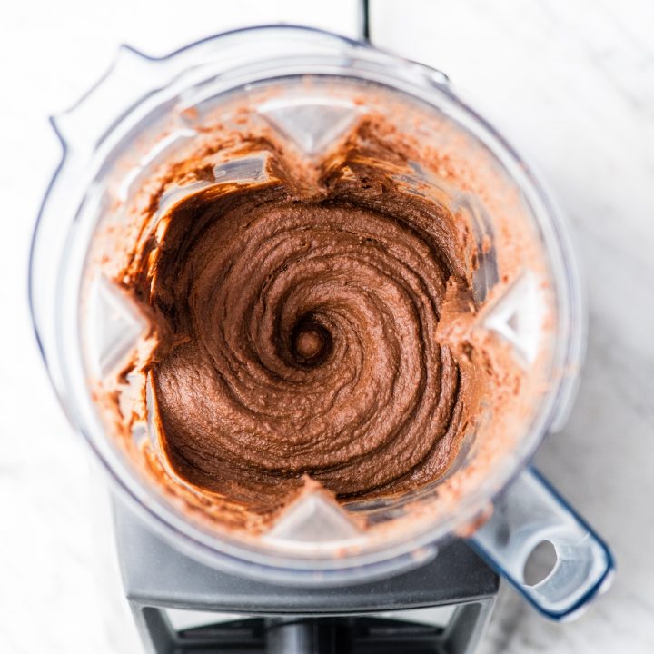 Overhead view of a vortex of Chocolate Hummus in the Vitamix blender 