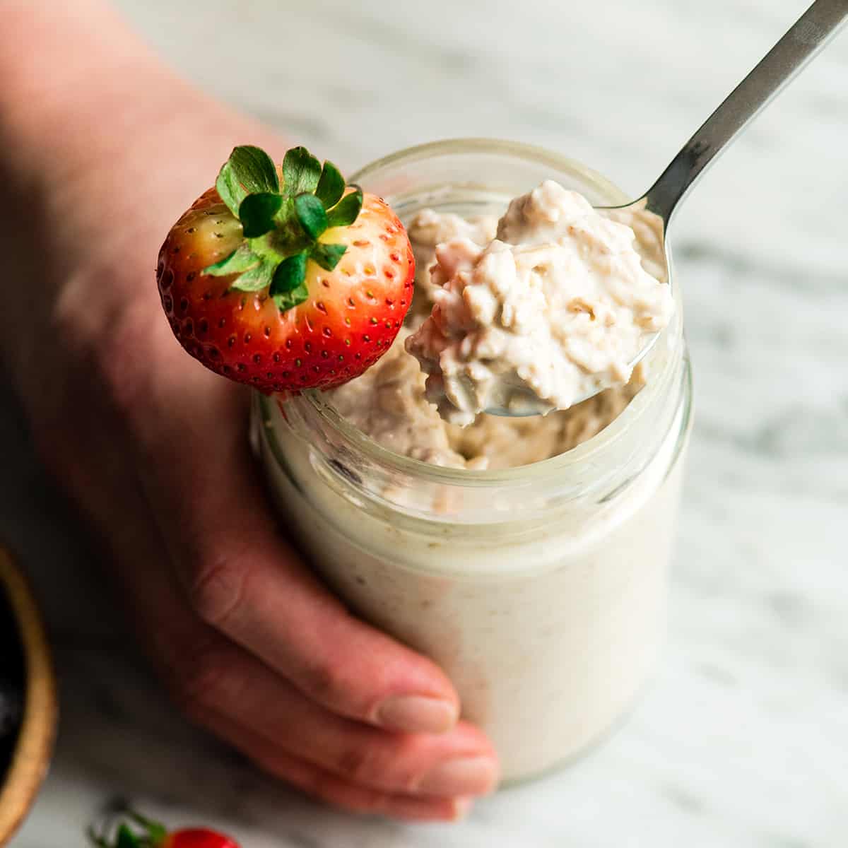 Overhead view of a jar of yogurt overnight oats