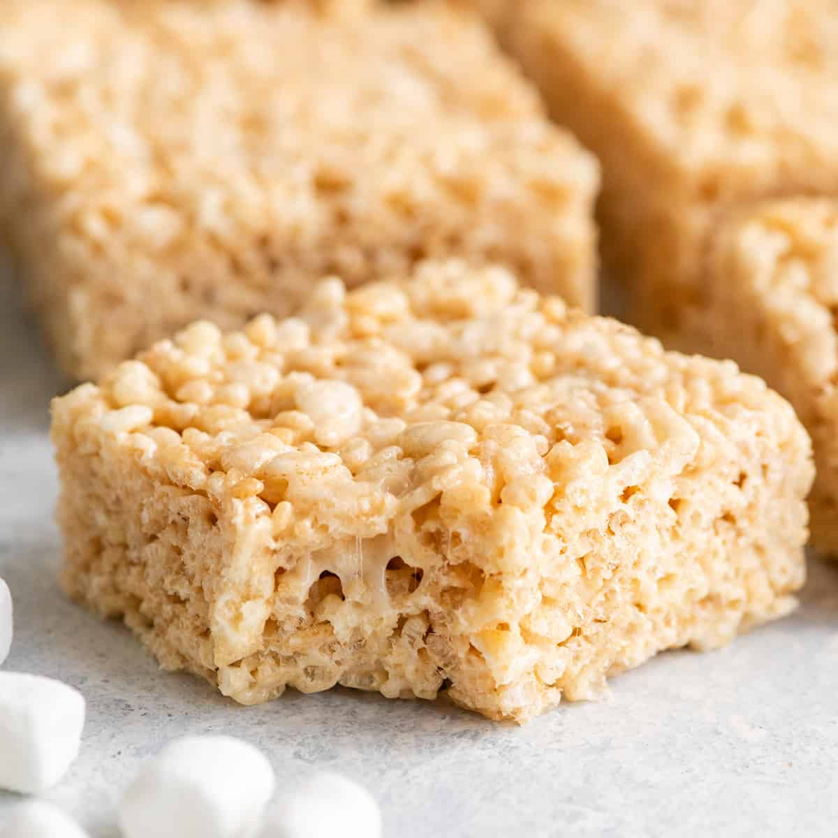 a rice crispy treat with a bite taken out of it