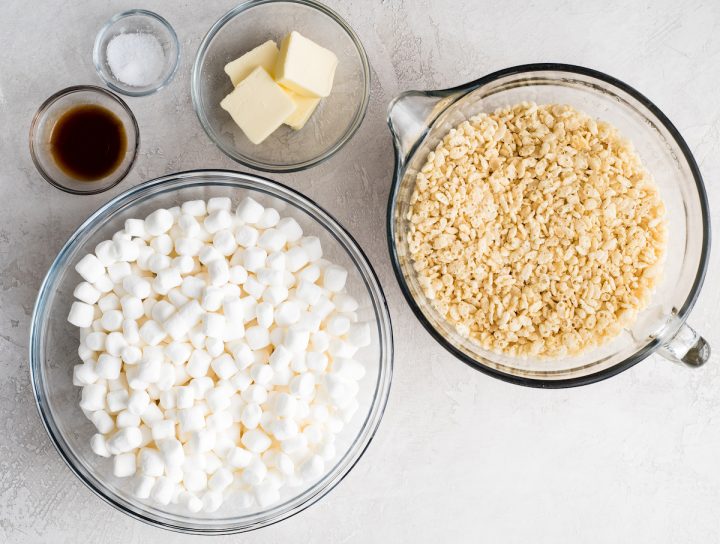 overhead view of the ingredients for this Rice Crispy Treats recipe in glass bowls