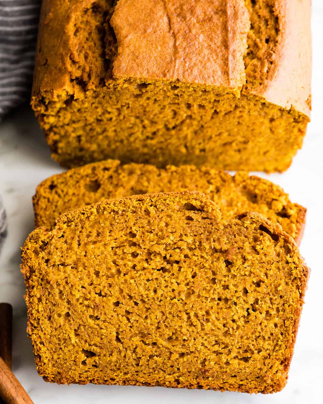 front view of two slices of pumpkin bread