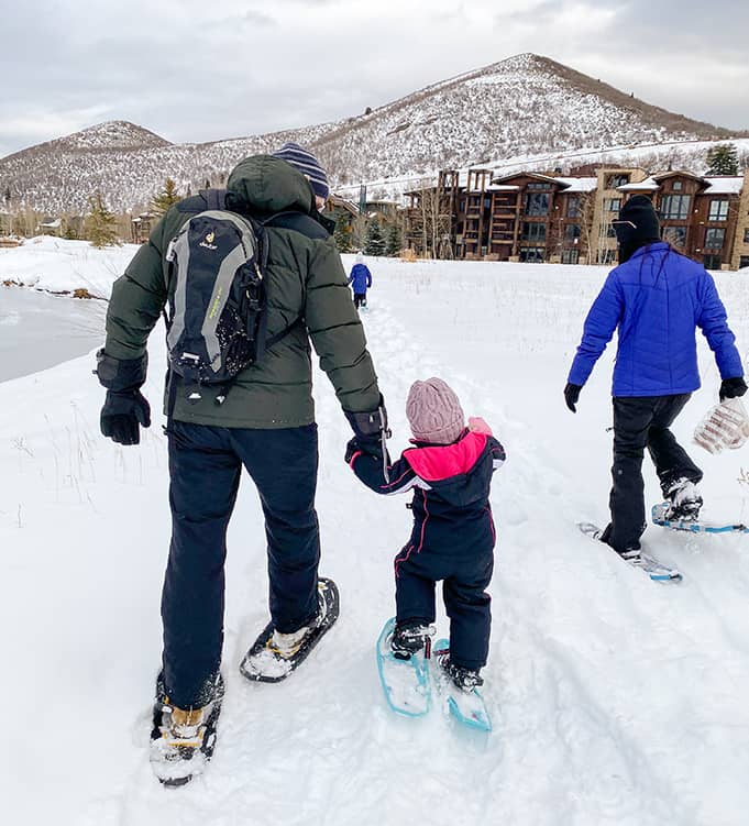 father and daughter snowshoeing at Deer valley Resort