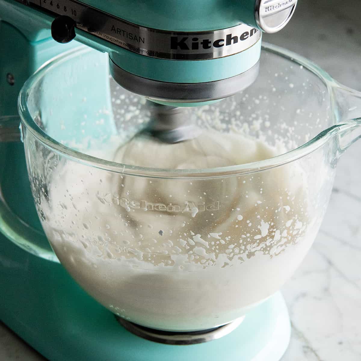 How to Make Whipped Cream - a standing mixer beating heavy cream