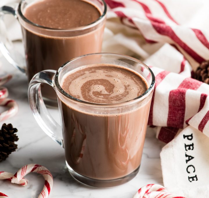 two mugs full of Peppermint Hot Chocolate with no toppings 